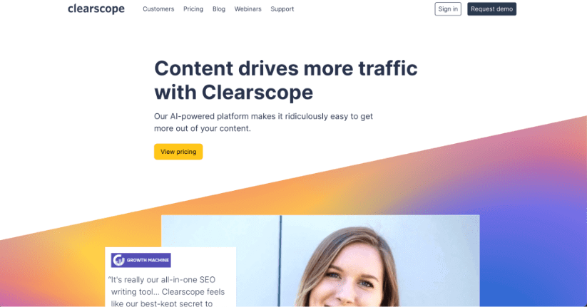 Clearscope homepage with a headline about content driving more traffic and a testimonial, against a colorful background.