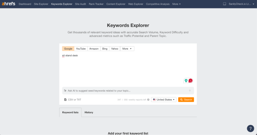 Ahrefs Keywords Explorer tool with the input 'sit stand desk' ready for search analysis.