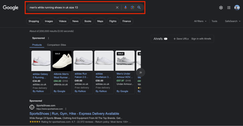 Google search results for men's white running shoes in UK size 13, showing sponsored product listings and a search box with the query entered.