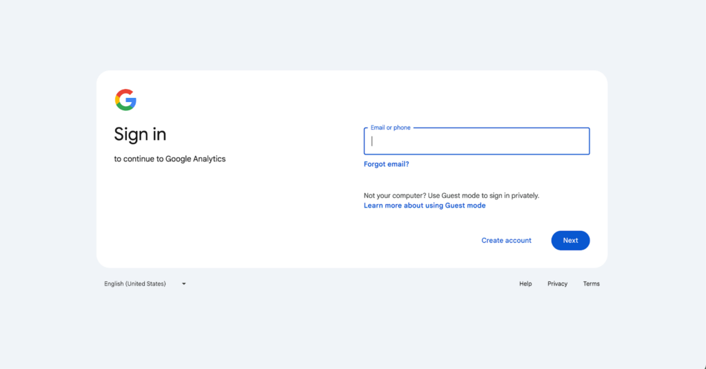 Google Analytics sign-in page with fields for email or phone input, offering options to create an account or recover a forgotten email.