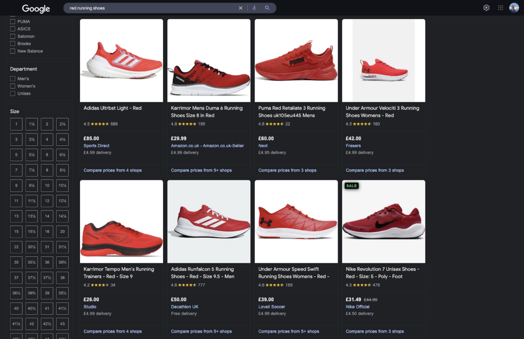 Google Shopping search results for red running shoes. Displays various brands, prices, reviews, and store comparisons for red running shoes.