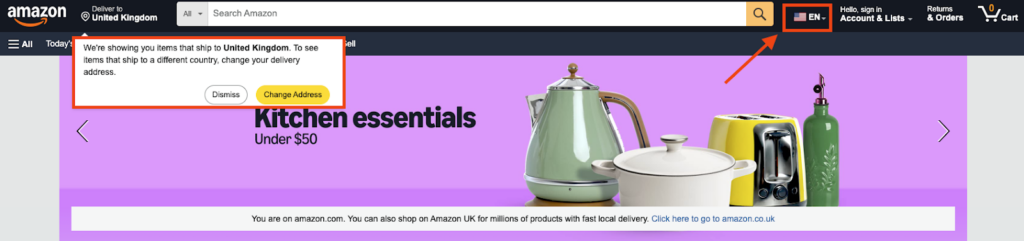 Amazon.com showing location alert for United Kingdom shipping with language and country selection menu highlighted above kitchen essentials banner