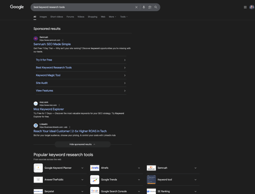 Google search results page for best keyword research tools showing sponsored ads for Semrush and Moz Keyword Explorer, and popular tools like Google Keyword Planner, Ahrefs, AnswerThePublic, and Serpstat.